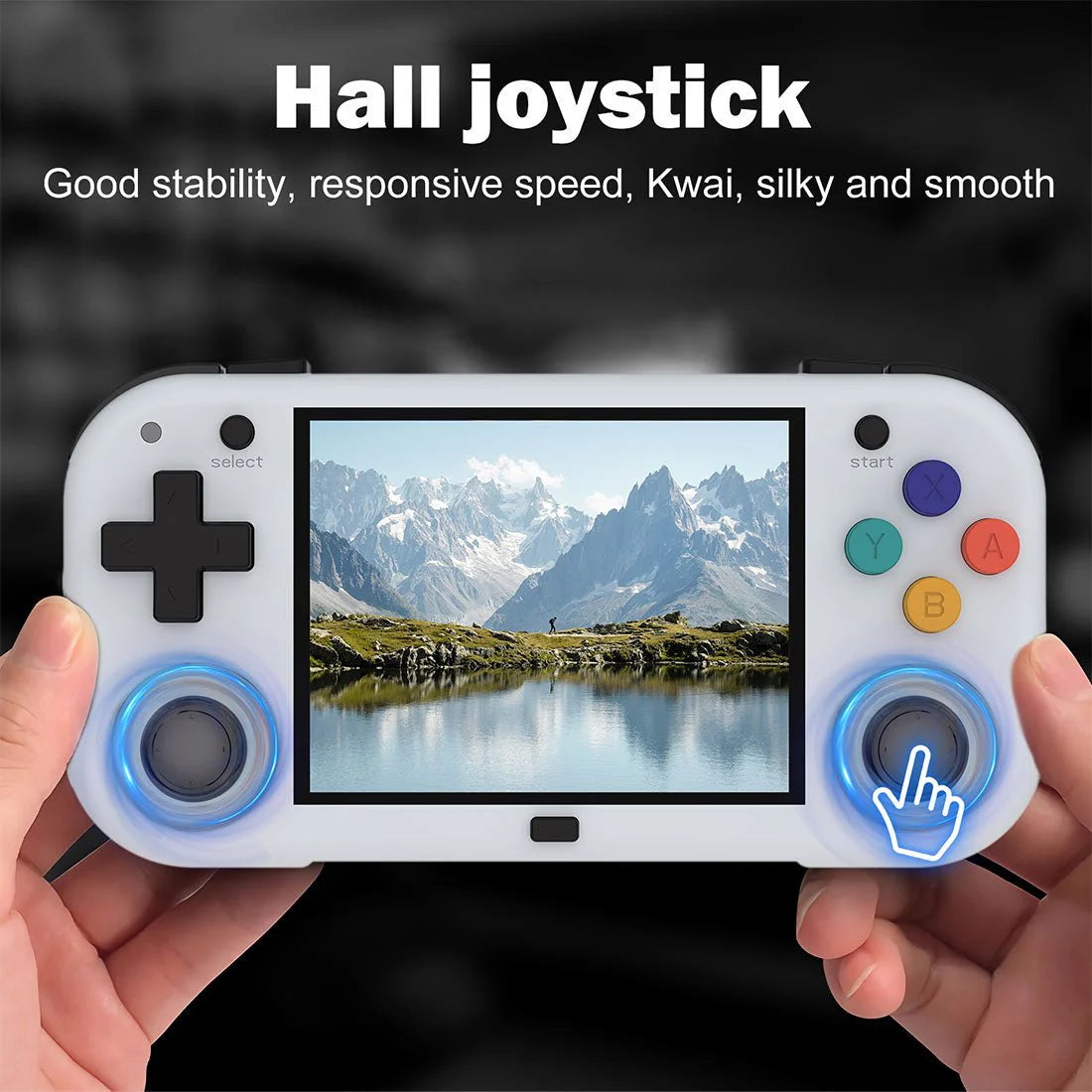Handheld gaming console with joystick and buttons displaying a mountainous landscape on screen.
