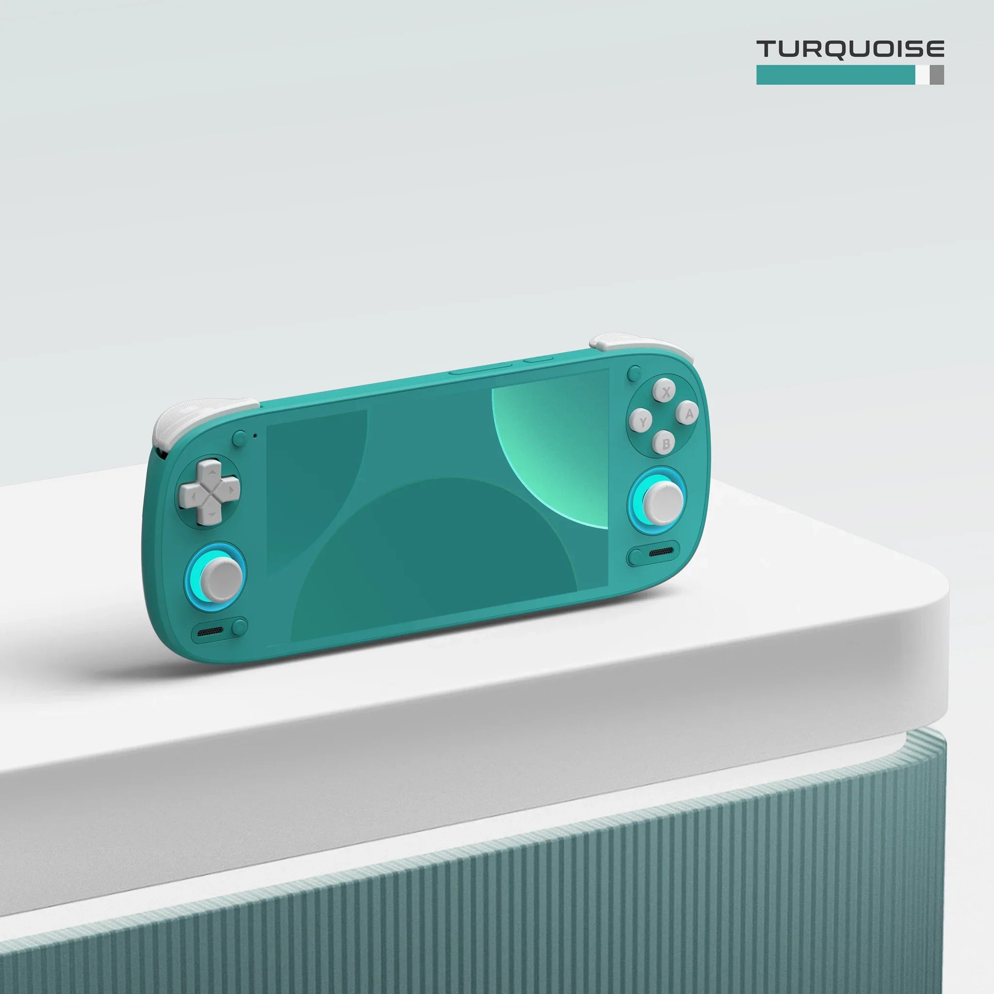 Turquoise handheld gaming console on a white surface with 'Turquoise' label above.