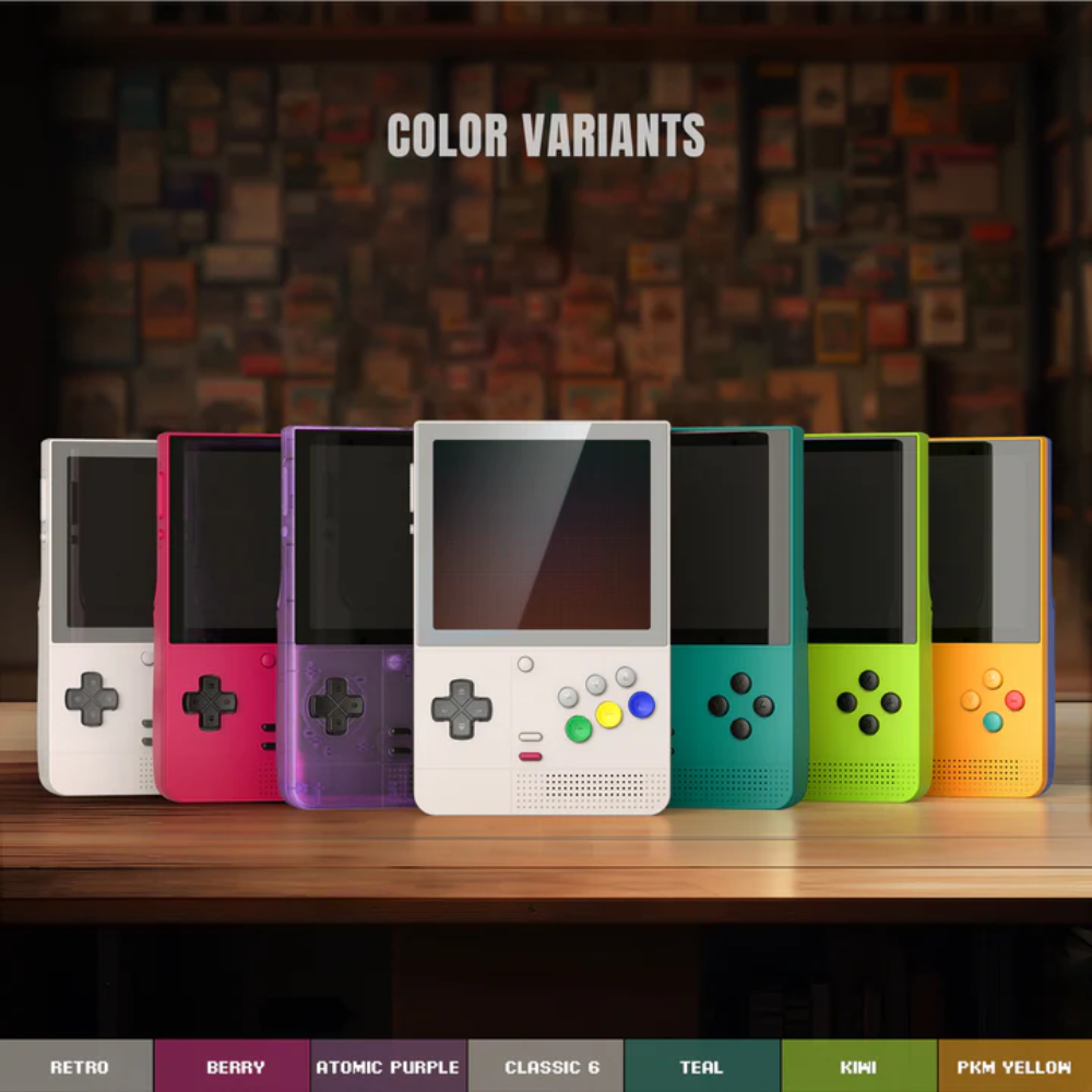 Row of colorful handheld gaming consoles on a wooden surface with a blurred background.